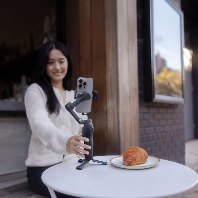 Personnes avec caméra en main